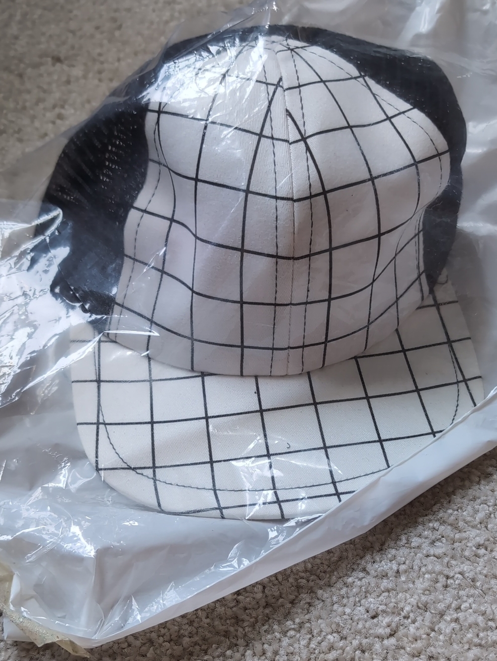 George White and Black Grid Trucker Hat